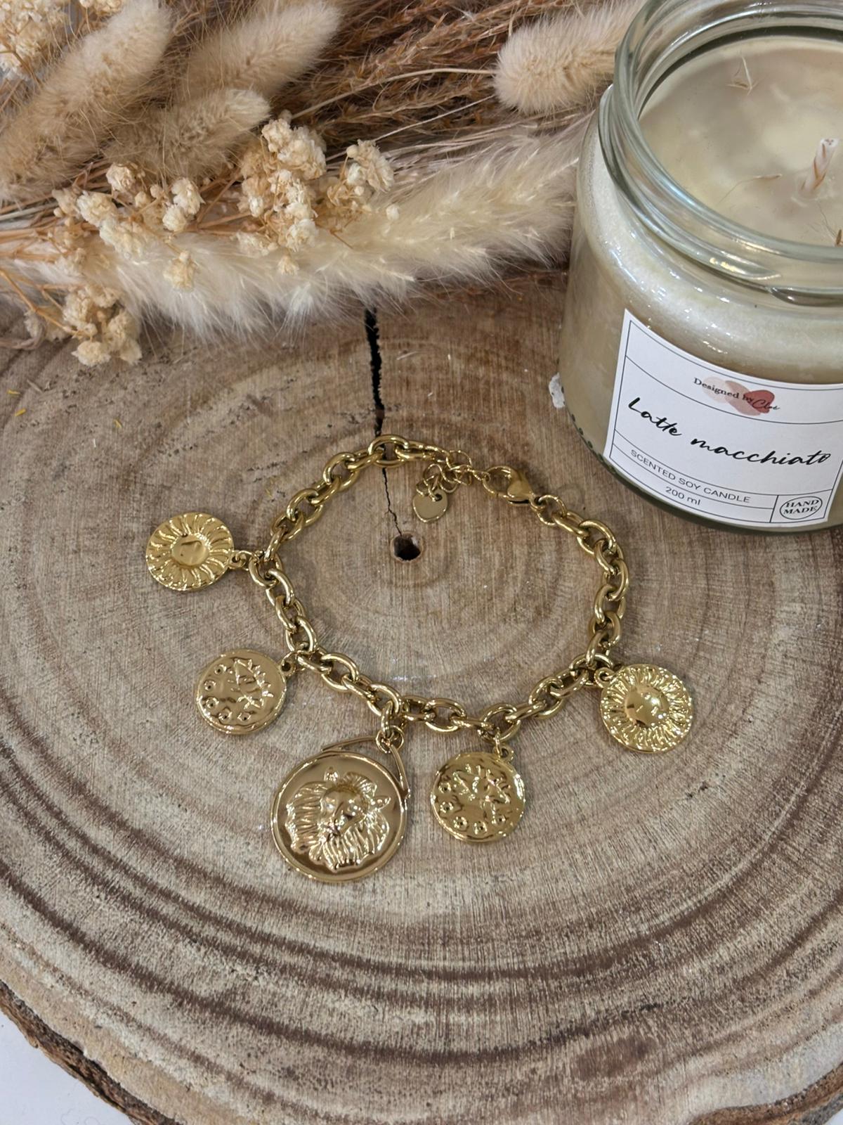 Bracelet breloques Lya en acier inoxydable, élégant et moderne, parfait pour ajouter une touche raffinée et délicate à votre poignet.