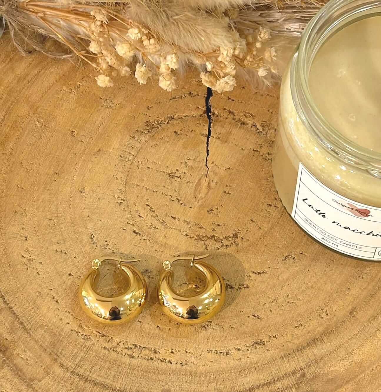 Boucles d'oreilles Lilou en acier inoxydable, raffinées et modernes, parfaites pour sublimer votre style avec une touche élégante.