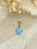 Charms Fleur bleue en acier inoxydable